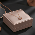 Rose Gold Clover Necklace in gift box studio shot
