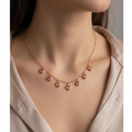 Gold Multi Heart Charm Necklace lifestyle neck shot