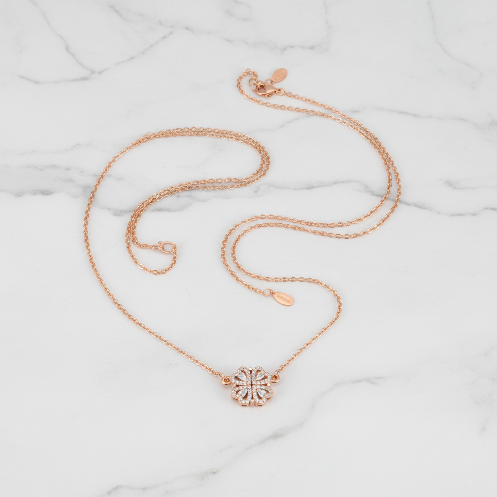 Rose Gold Clover Necklace flat lay marble